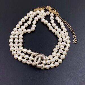CHANEL Pearl Necklace with Gold Logo